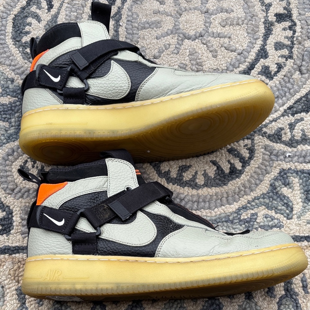 Stylish High-Top Sneakers with Orange Accents - Picture 2 of 6